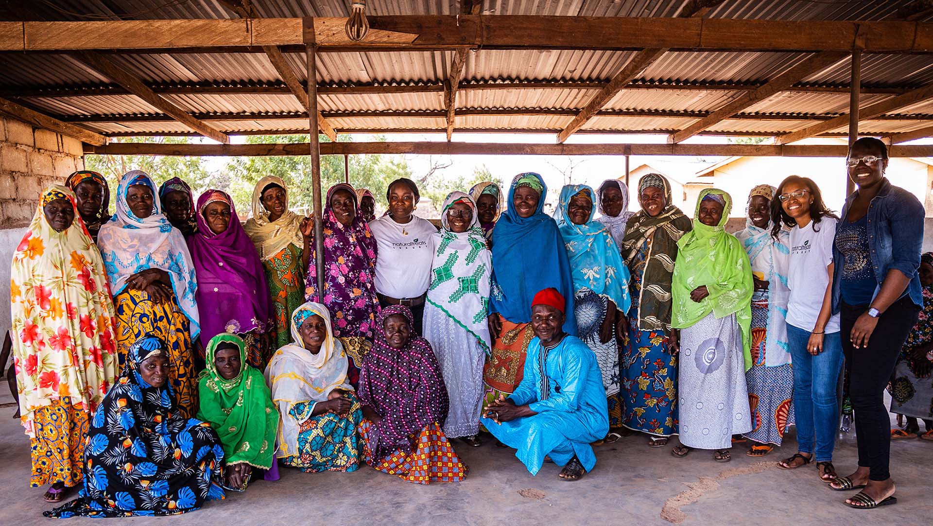 A group of people smiling for the camera.